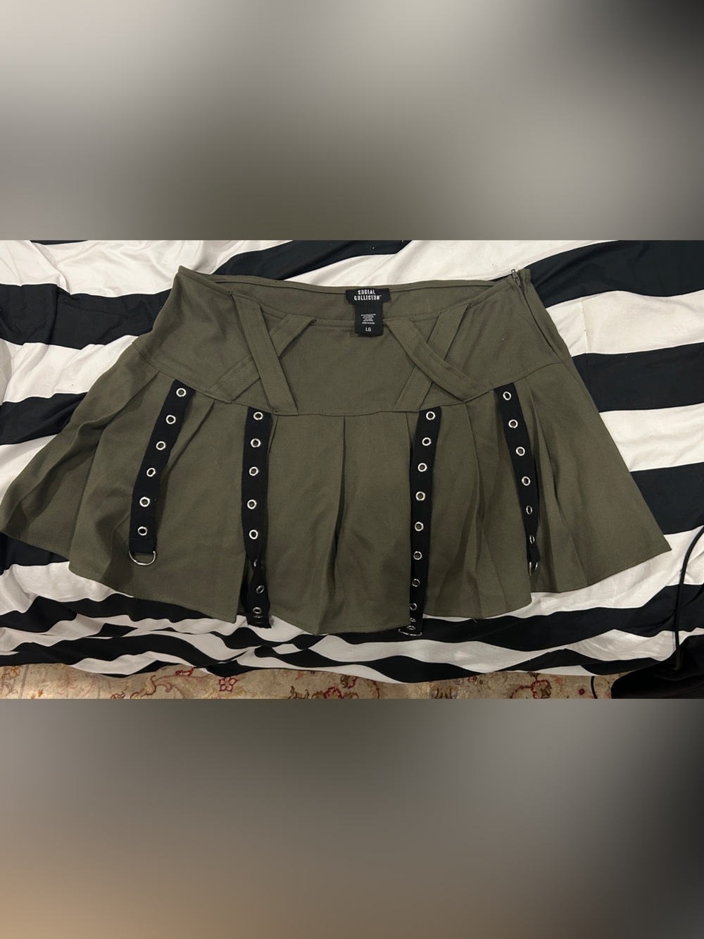 Olive Green Pleated Mini Skirt with Grommet Straps - Social Collision